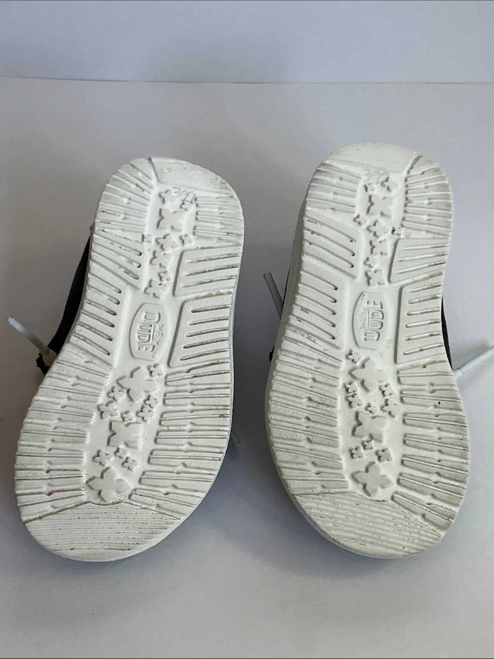 Hey Dude Wendy Black and White Cow Print Slip-On Loafers